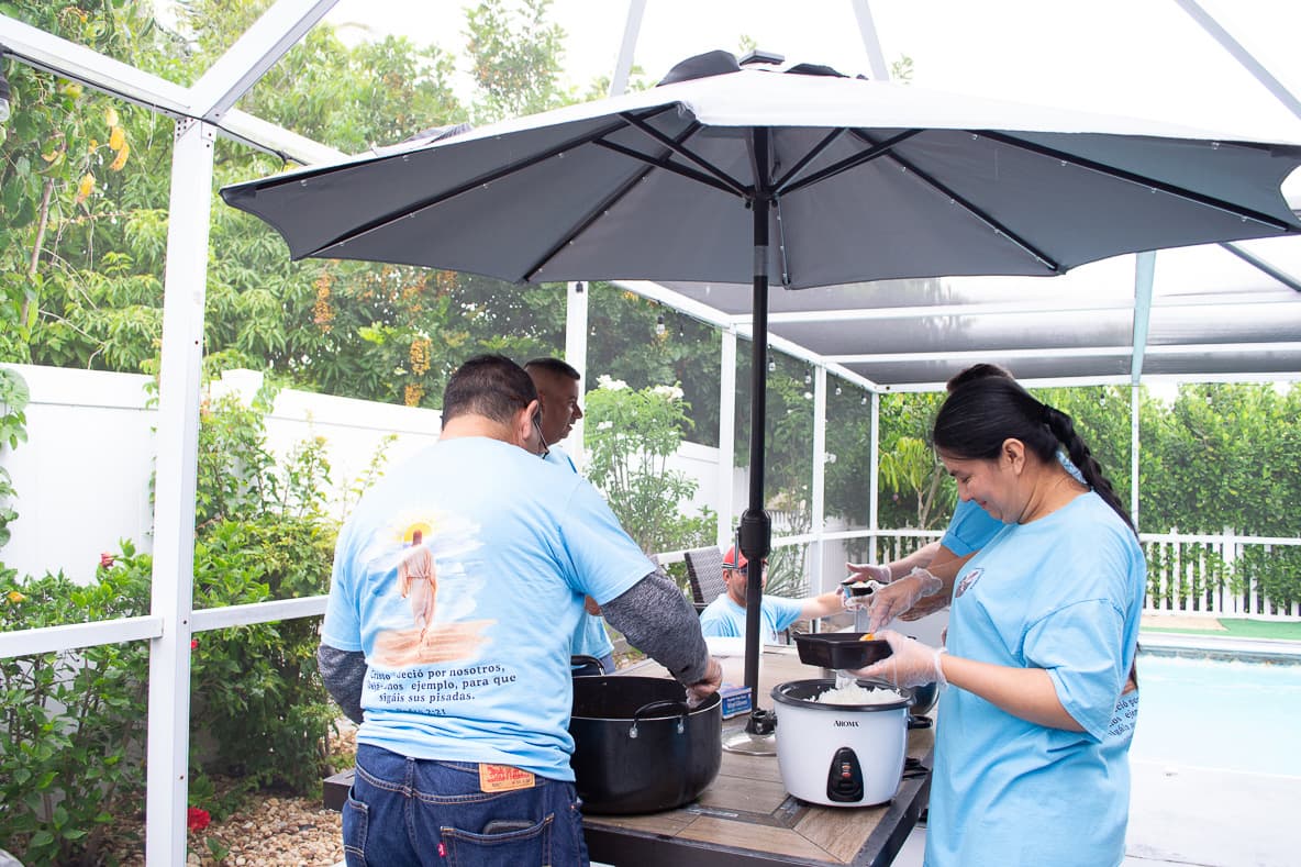 Volunteers serving food to the community