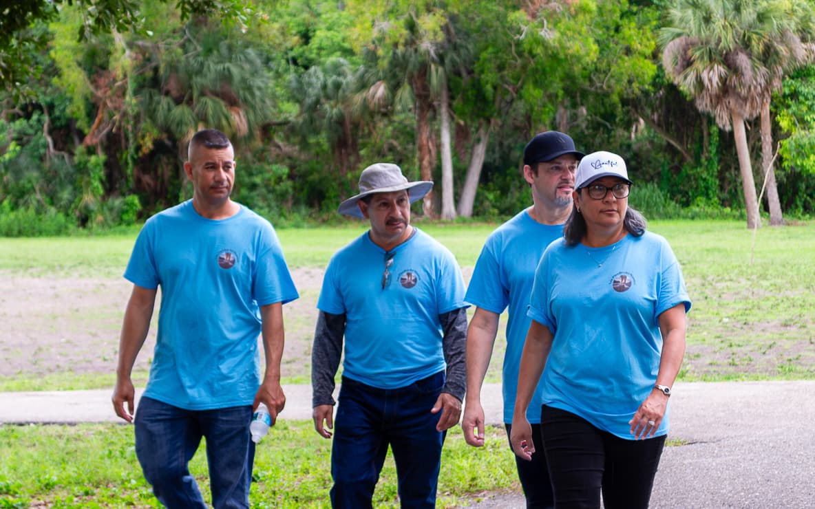 A team of volunteers walking together on an outreach day
