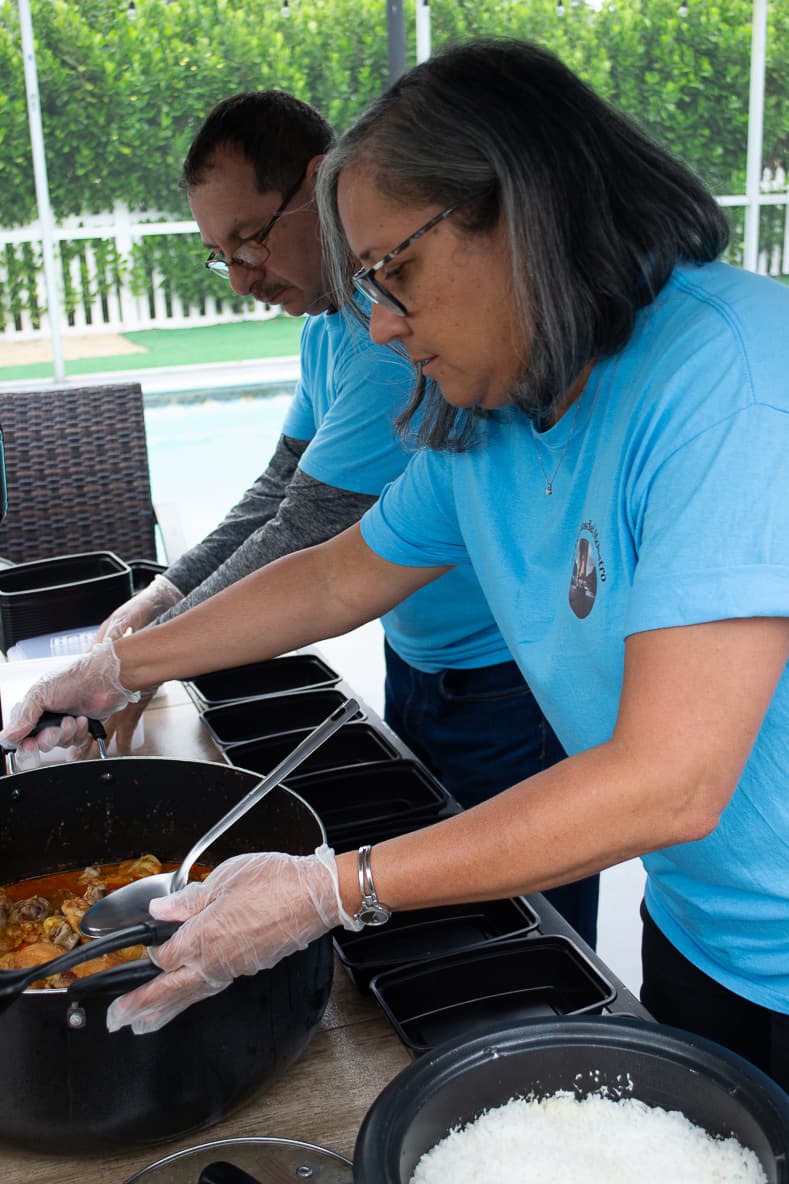 Volunteers preparing food